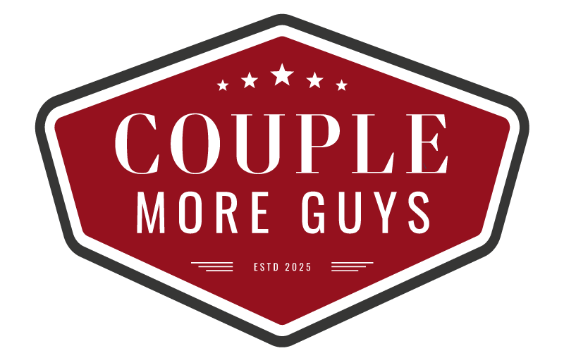 A red, badge-shaped logo with white text that reads “COUPLE MORE GUYS” above “ESTD 2025,” with five white stars above the main text and a black and white border surrounding the badge.